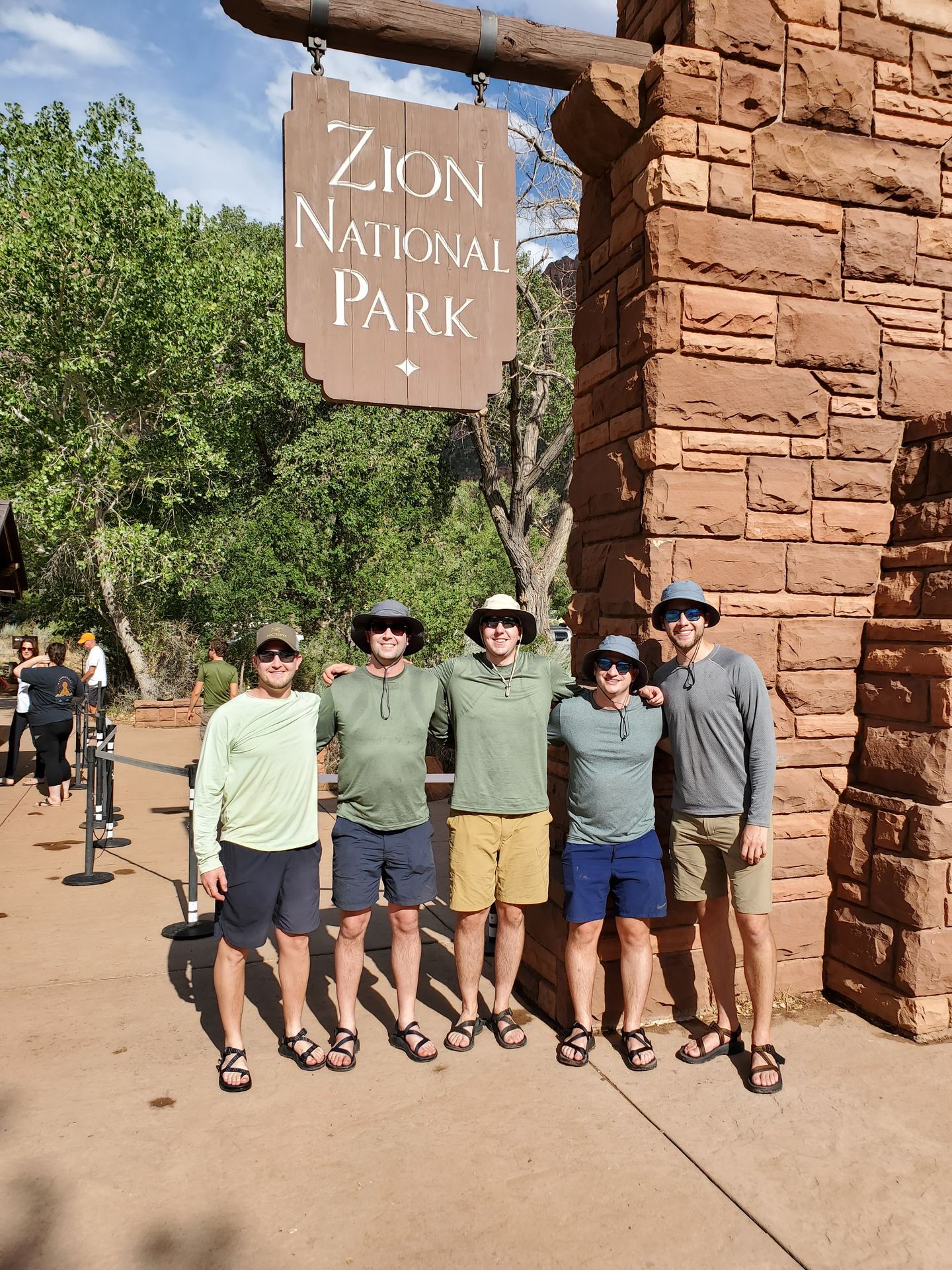 The crew at the Zion National Park entrance sign